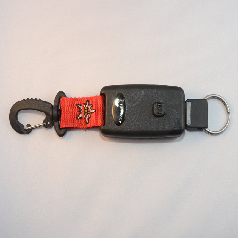 Laden Sie das Bild in Galerie -Viewer, Arretierbarer Retractor mit einem drehbaren Kunststoff Karabiner und Inox- Splittring 32mm, Seillänge ca. 50cm