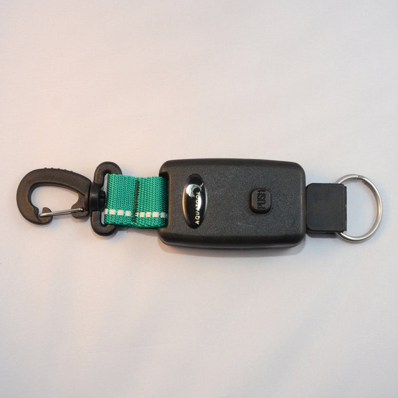 Laden Sie das Bild in Galerie -Viewer, Arretierbarer Retractor mit einem drehbaren Kunststoff Karabiner und Inox- Splittring 32mm, Seillänge ca. 50cm