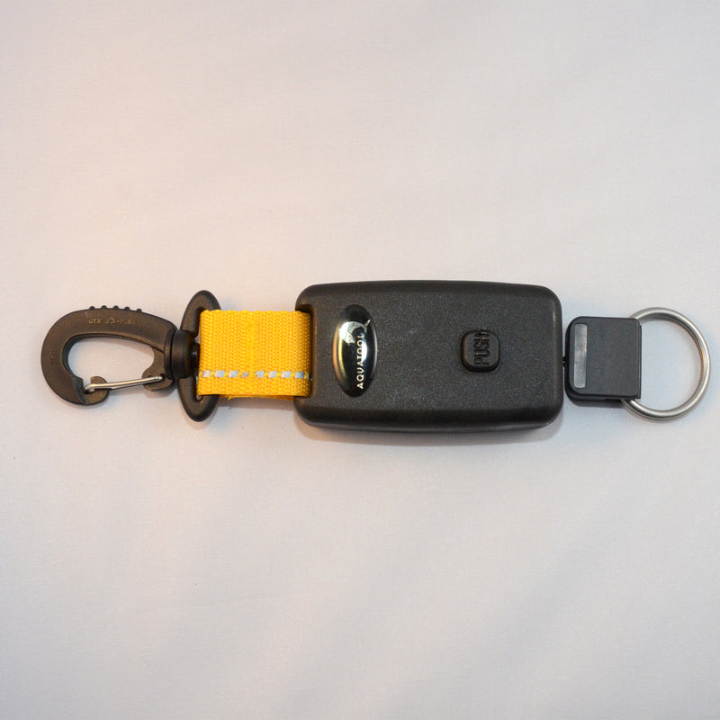 Laden Sie das Bild in Galerie -Viewer, Arretierbarer Retractor mit einem drehbaren Kunststoff Karabiner und Inox- Splittring 32mm, Seillänge ca. 50cm