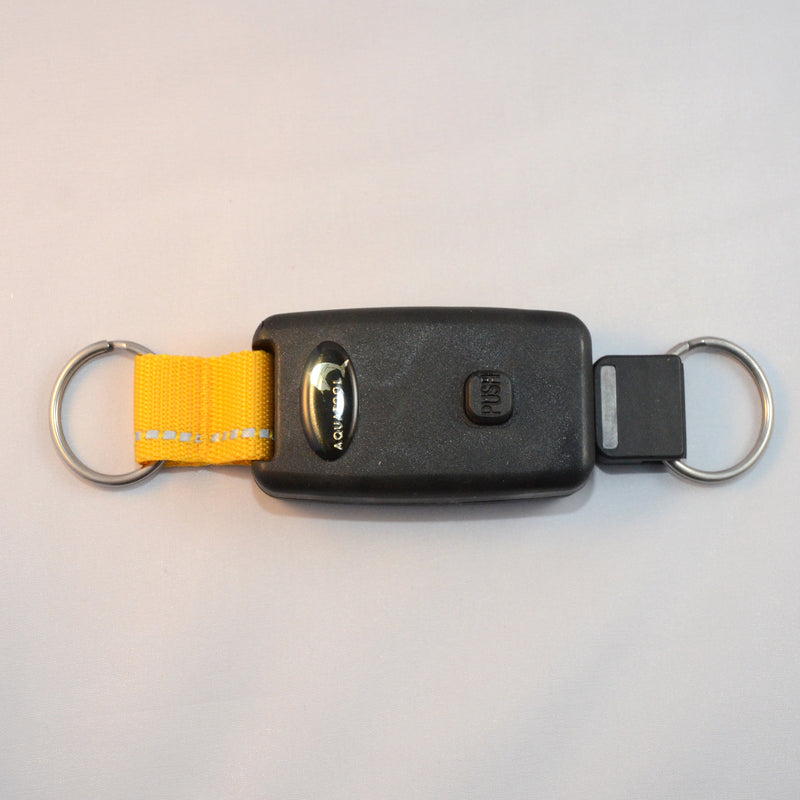 Laden Sie das Bild in Galerie -Viewer, Arretierbarer Retractor mit beidseitigem Inox Splittring 32mm, Seillänge ca. 50cm